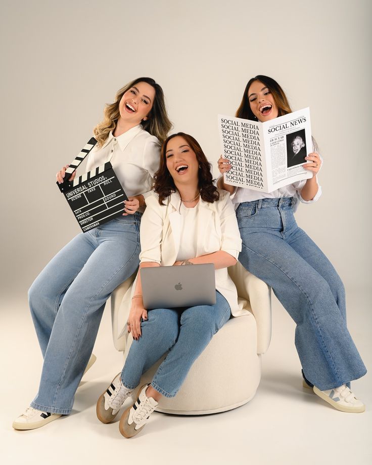 A creative team working together around a laptop